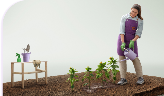 Woman watering plants and soil