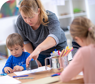 Patient Laura who was diagnosed with AChR Ab+ gMG, doing arts and crafts with two children