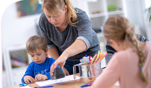 Patient Laura who was diagnosed with AChR Ab+ gMG, doing arts and crafts with two children